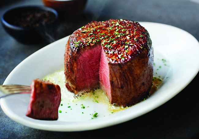 A slice of steak from Ruth's Chris Steakhouse, one of the top 5 steakhouses in Calgary