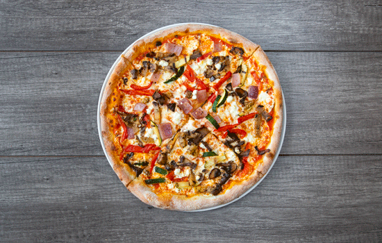 Grilled vegetable pizza from one of Calgary's vegetarian restaurants Via Cibo. Courtesy of Send and Receive